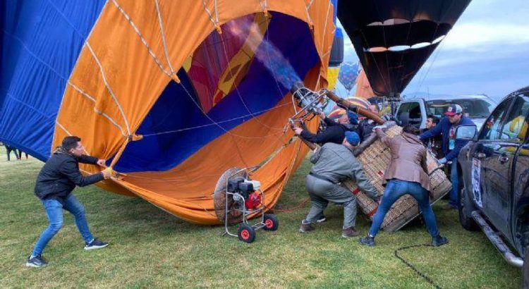 Viento arrastra globos aerostáticos en la FIG de León
